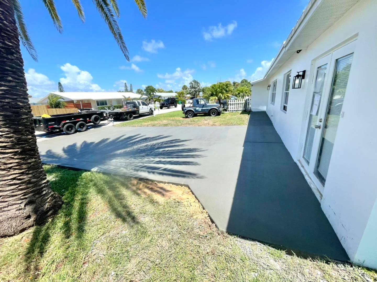 Newly poured concrete driveway and walkway home